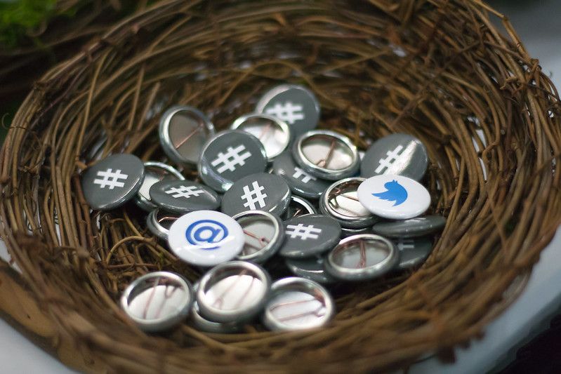 "Twitter Buttons at OSCON" by Garrett Heath is licensed under CC BY 2.0 
